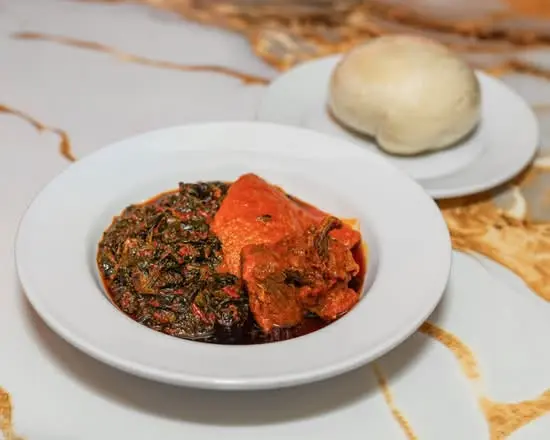 Authentic Nigerian jollof rice at BISIKITCHEN & HADIORS RESTAURANT in Winnipeg, MB