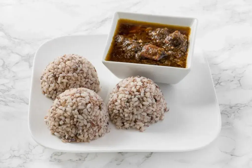 Nigerian ofada rice with ofada sauce at Bisi Kitchen Corydon